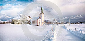 Splendid snowy winter scene of  Valberg church on Lofoten Islands