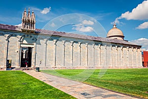 Splendid spring view of famous Leaning Tower place in Pisa. Sunny morning scene of Piazza dei Miracoli Square of Miracles, Italy