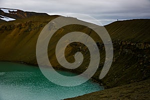 Splendid view of famous crater Viti at Krafla geothermal area in summer with snow present.  Myvatn region, North part of Iceland