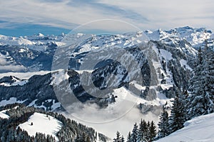 Splendid winter alpine scenery with high mountains photo