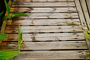 Spliced wooden planks are laid on the ground as architectural decorations in tourist attractions