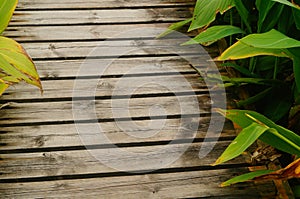 Spliced wooden planks are laid on the ground as architectural decorations in tourist attractions