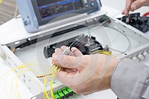 Splicing the fiber optic cable on spice tray