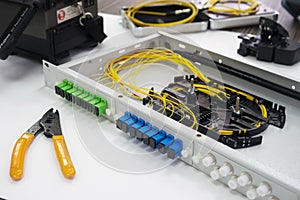 Splicing the fiber optic cable on spice tray