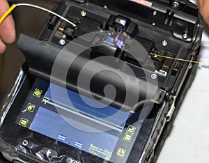 Splicing Fiber Optical Cable with Optical Fiber Fusion Splicer instrument professional tool photo