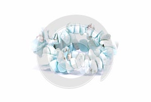 Splintered larimar chain on white background