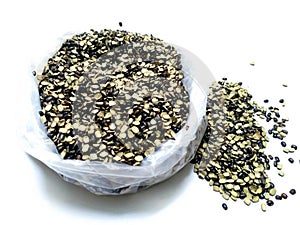 Split Black Lentil Also Know as Black Gram, Black Urad Dal, Isolated on White Background