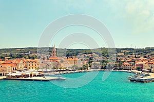 SPLIT, CROATIA - JULY 12, 2017: Panoramic view on harbor of Supetar city from the side of sea - Croatia