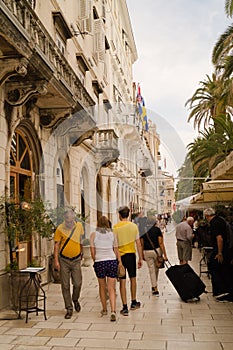 Split, Dalmatia, Croatia; 09/07/2018: Tourists walk in the old district of Split.