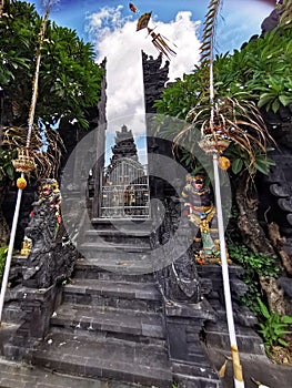 Split gates at the Batuan temple referred locally as Pura Puseh Batuan on Bali Island in Indonesia photo