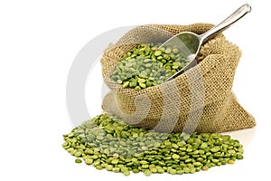 Split green peas in a burlap bag