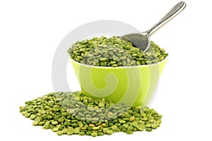 Split green peas in a green bowl