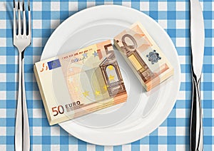 Split money on plate, finance share concept