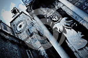 Split - old clock tower and saint sculpture