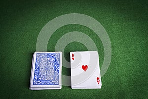 Split pack of playing cards showing Ace of Hearts