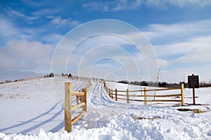 Split Rail Fence Winding Up Snowy Hill