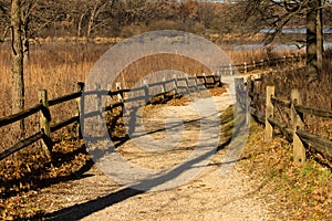 Split rail lined Gravel path at the Little Red Schoolhouse Nature Center