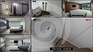 Split screen security camera. monitoring the display of video recording from a surveillance camera