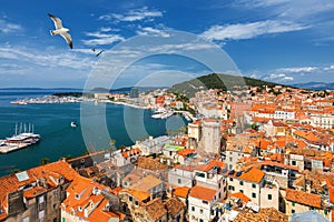 Split waterfront and Marjan hill aerial view, Dalmatia, Croatia. Panoramic summer cityscape of old medieval city Split, Croatia,