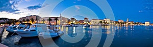 Split waterfront panorama in blue hour