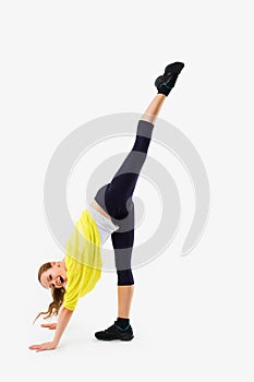 Split. Young woman doing stretching exercise.