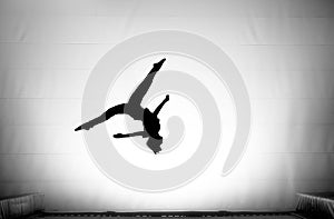 The splits in somersault on trampoline