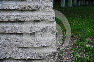 splitted granite boulder rock. Splitting with drilling holes and typing wedges. Used in building industry, stonemasonry