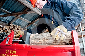 Splitting wood in the woodshed