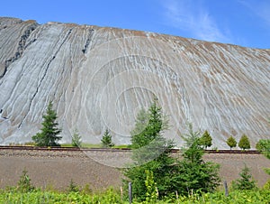 Spoil tip or boney pile, gob pile, bing, batch or pit heap is a pile built