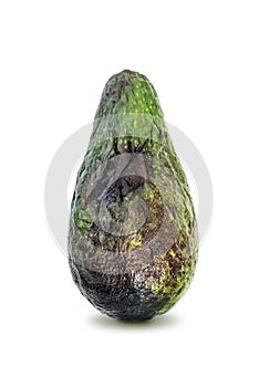 Spoiled avocado isolated on white background. Side view