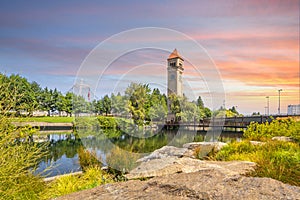 The Spokane Clock Tower and Pavilion along the river in Riverfront Park, Spokane Washington.