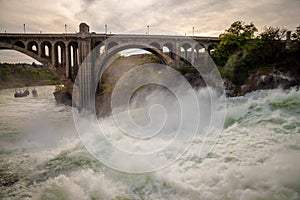 The Spokane river in spring flood near downtown Spokane, Washington