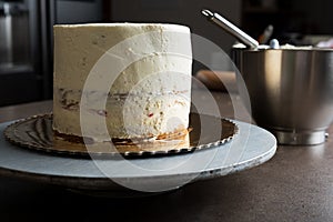 Sponge cake filled with butter cream and decorated with frosting