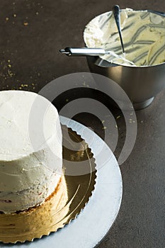 Sponge cake filled with butter cream and decorated with frosting