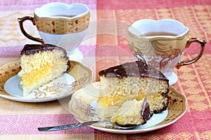 Sponge Cake with Lemon Cream and Chocolate Glaze