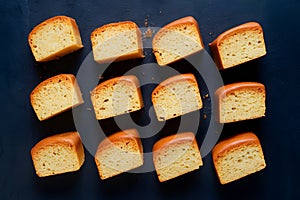 Sponge cake slices, fluffy confections ready to tantalize taste buds photo