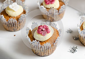 Sponge and cream cup cakes with a shallow depth of field