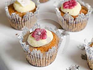 Sponge and cream cup cakes with a shallow depth of field