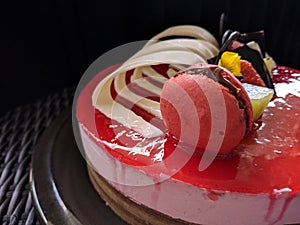 Sponge pieces on a table neatly arranged, served to visitorsStrawberry mousse cake served with topping strawberries, kiwi fruit an