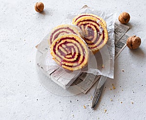 Sponge roll cake pieces with cherry jam