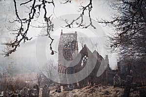 A spooky, abandoned graveyard with a ruined church in the background. With a vintage, grunge edit