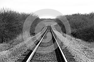 spooky black and white photograph retro vintage rural train tracks transportation railway countryside transport rails deserted