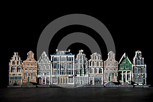 Spooky canal houses against black background