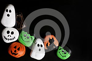 Spooky Cartoon Halloween Painted Rocks Bordering Black Background