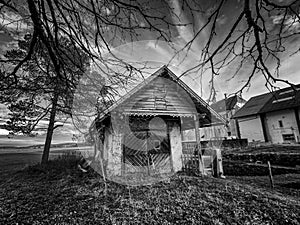 Spooky cottage in black and white