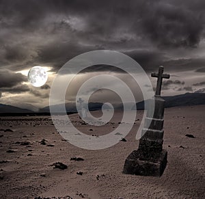 Spooky Halloween graveyard with dark clouds