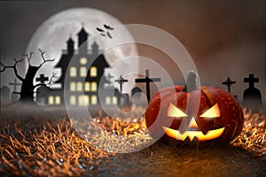 Spooky Halloween Pumpkin in graveyard. Halloween Party and Celebration
