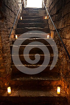 Spooky stone stairs in old castle