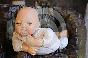 Spooky weathered baby doll portrait