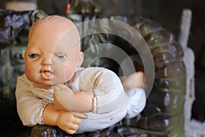 Spooky weathered baby doll portrait